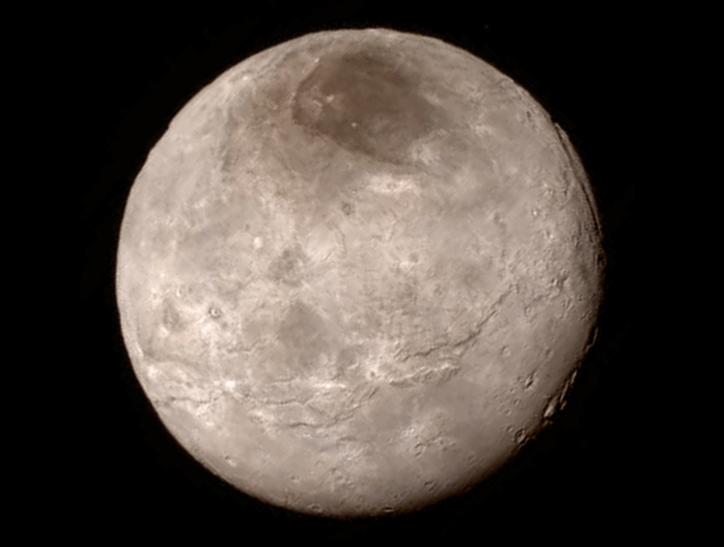 Charon księżyc Plutona - Foto: NASA/JHU APL/SwRI